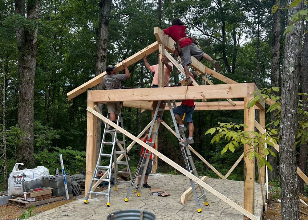 Wood beams and roof framing elements during construction