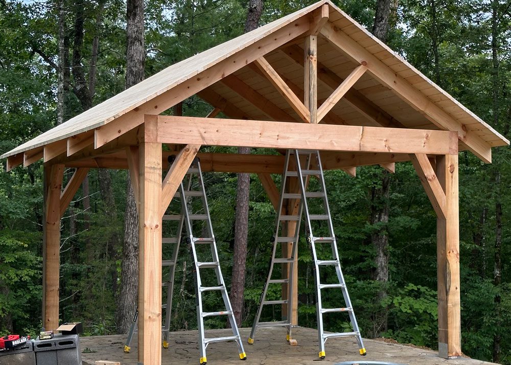 Framing for an outdoor structure built with wood posts and beams