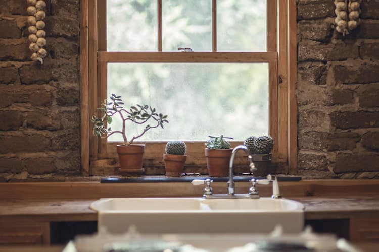 Farmhouse kitchen with apron sink and natural wood details